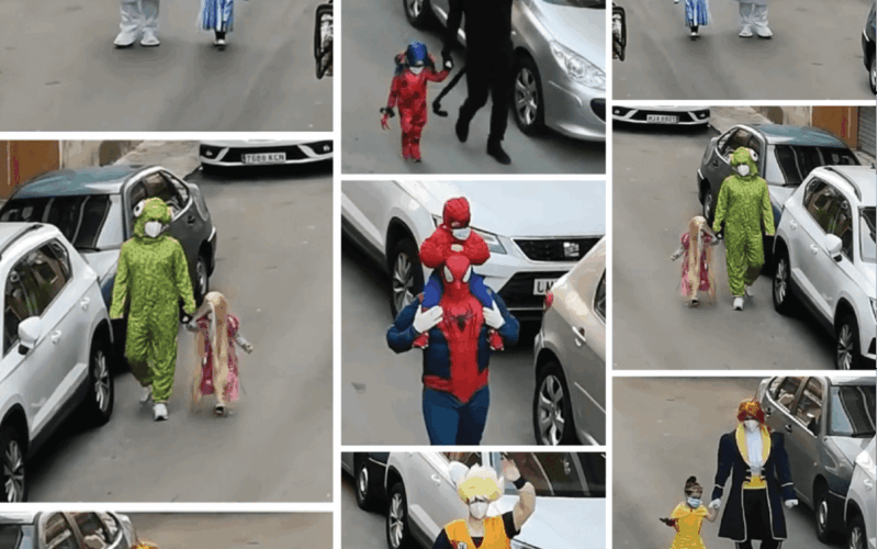 Pai e filha usam fantasias para levar lixo durante o isolamento na Espanha